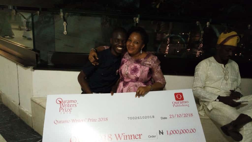 Michael winner of Quramo Writer's Award with Mom